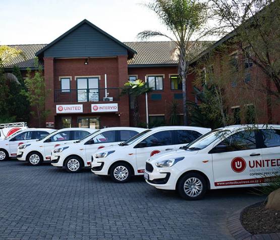 A row of United Telecoms vehicles representing a strong presence in South Africa