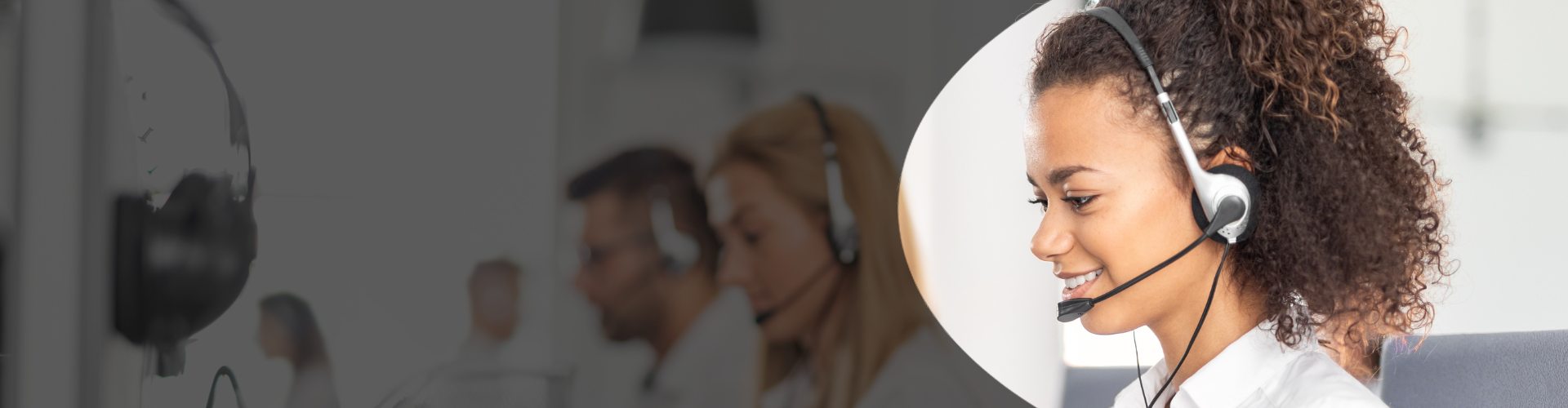 Contact centre agents wearing headsets handling inbound and outbound calls.