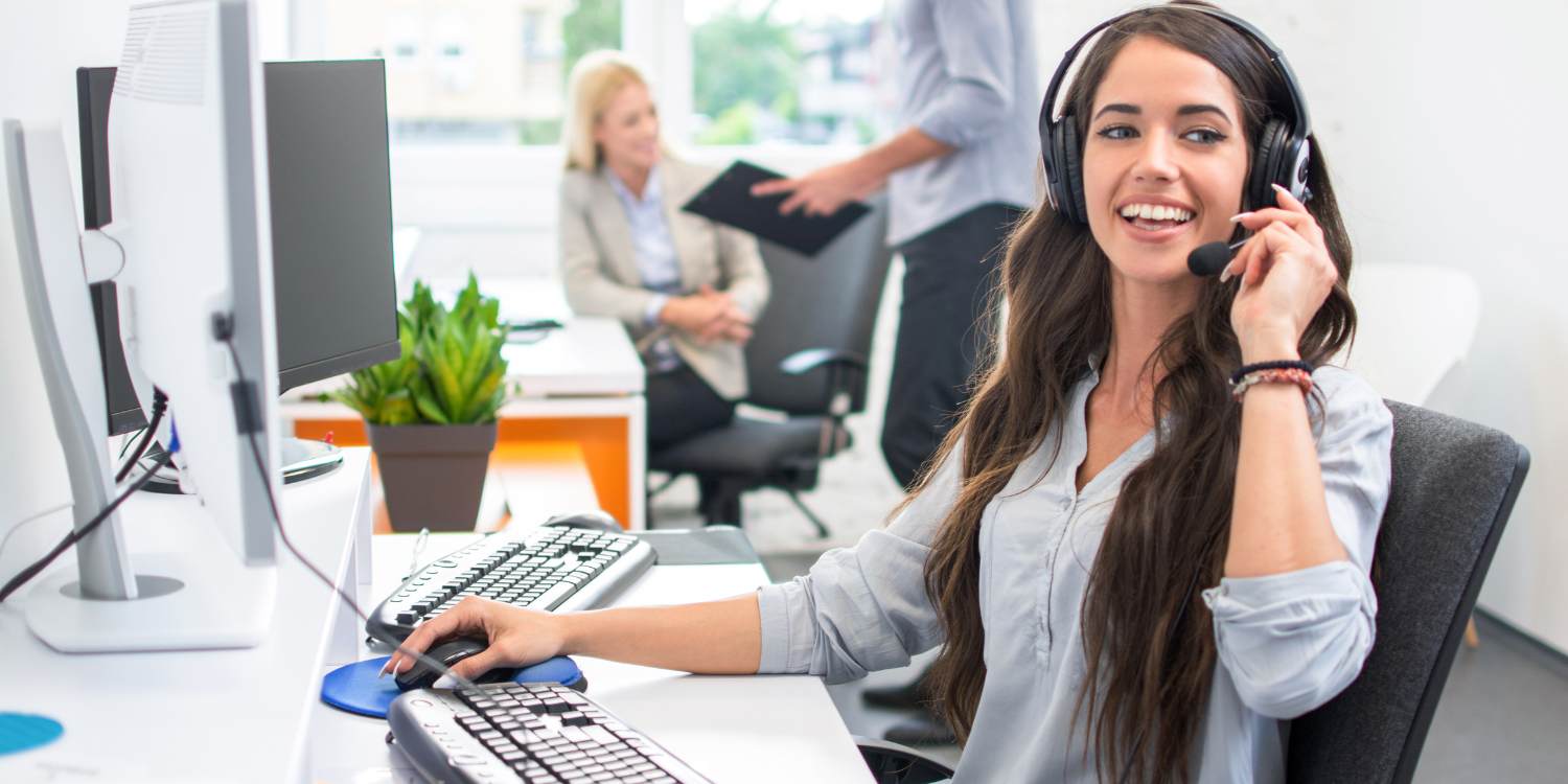 employee using headset for cloud PBX call