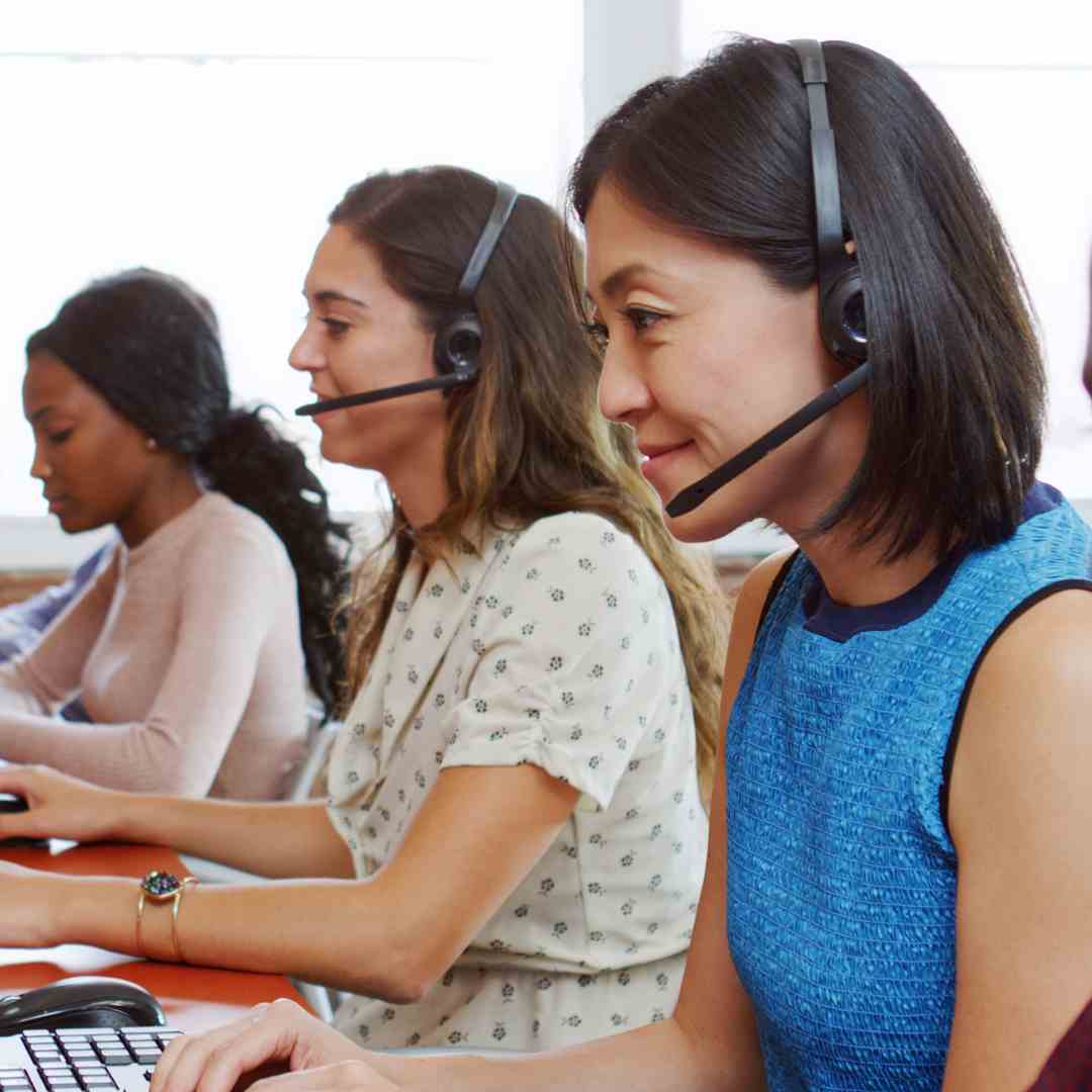 Woman using Fanvil phone and headset