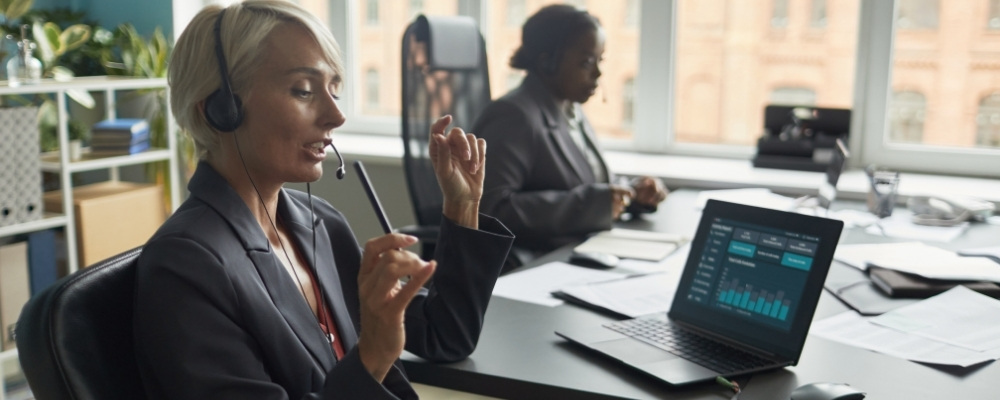 White woman making a call using a VoIP line