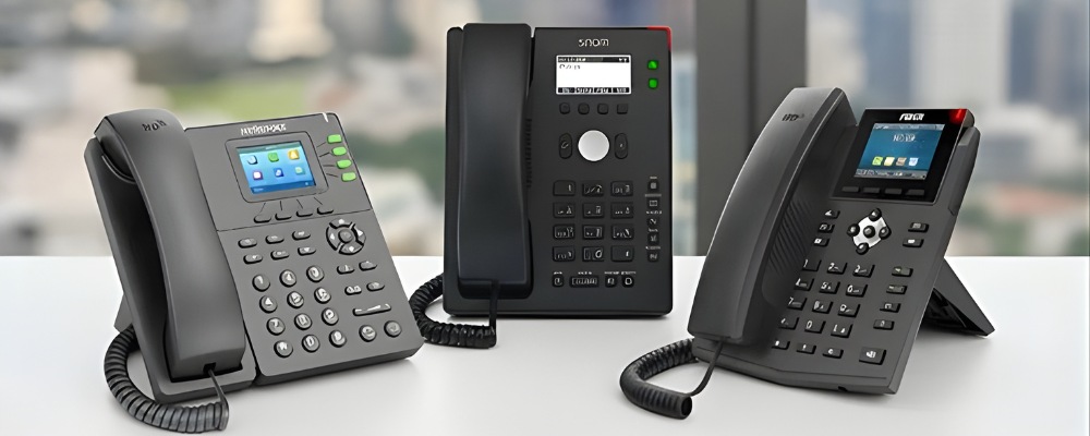 VoIP-enabled deskphones on a desk