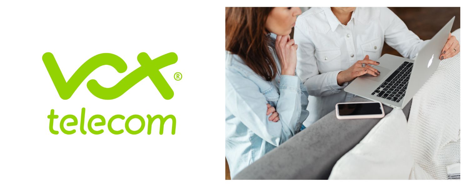 A pair of business owners having a meeting and looking at documents on their LTE-connected devices