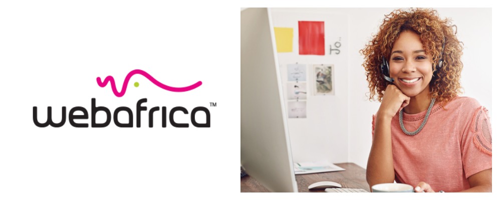 Webafrica business fibre consultant wearing pink top and smiling